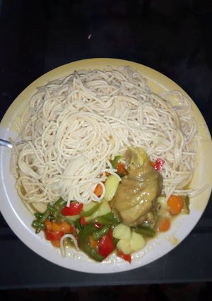 A picture of Spaggetti and Veggie curry sauce.
