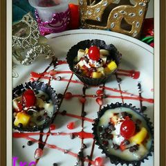 A picture of Choco cups filled with fruit custard.