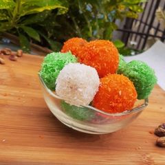 A picture of Tricolour coconut ladoo.
