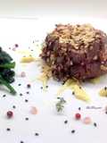 Filetto di vitello con salsa all'arancia e terra di cipolla e Carasau croccante