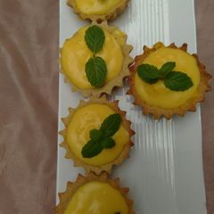 A picture of Custard filled tarts.