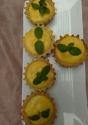 A picture of Custard filled tarts.