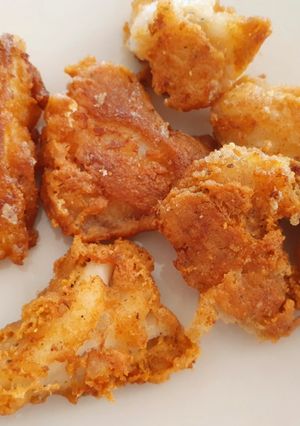 Una foto de Nuggets de merluza rebozado sin huevo y con cerveza