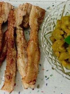 Una foto de Presa ibérica a la plancha y salteado de calabacín con ras el hanout
