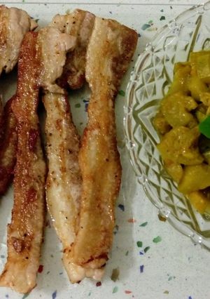 Una foto de Presa ibérica a la plancha y salteado de calabacín con ras el hanout