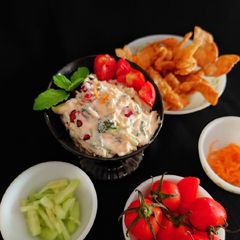 A picture of Salad in ranch dressing.
