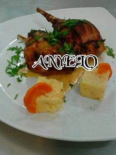 Una foto de Conejo a las finas hierbas