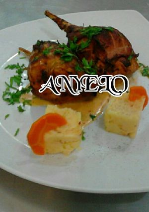 Una foto de Conejo a las finas hierbas