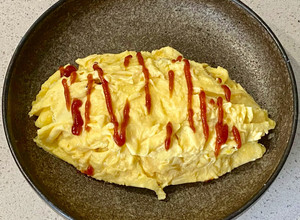 A picture of Omurice (Japanese omelette rice).