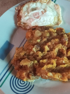 Una foto de Charquicán con huevo frito