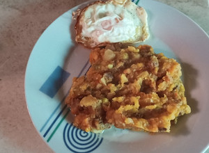 Una foto de Charquicán con huevo frito
