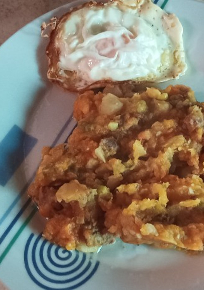 Una foto de Charquicán con huevo frito