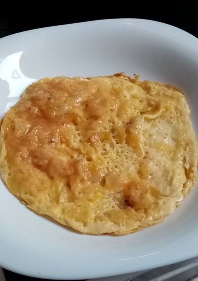 Una foto de Tortilla de patatas al huevo frito