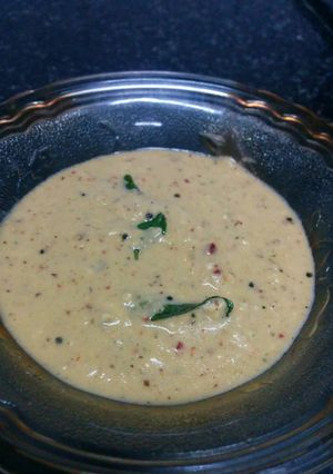 A picture of Red Coconut chutney with curd.