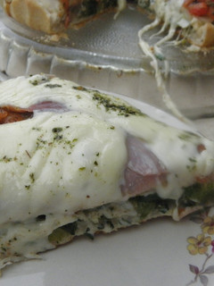 Una foto de Pizza doble o Pizza rellena