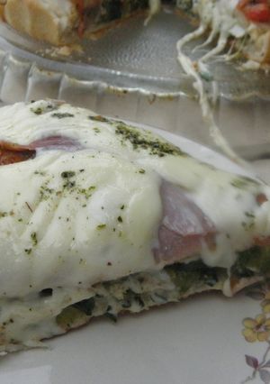 Una foto de Pizza doble o Pizza rellena