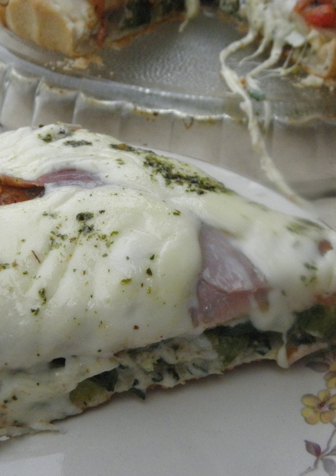 Una foto de Pizza doble o Pizza rellena