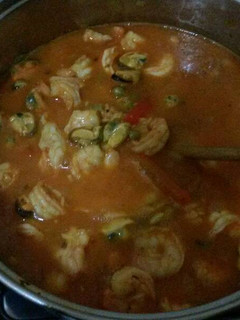Una foto de Arroz de mejillones con camarones