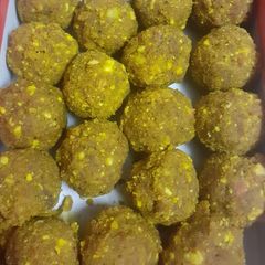 A picture of Haldi k ladoo.