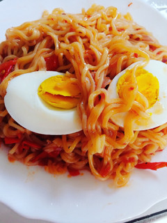 A picture of Fried Indomie with Kienyeji eggs.