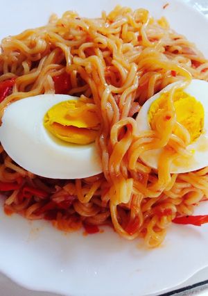A picture of Fried Indomie with Kienyeji eggs.