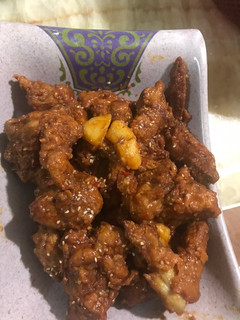 A picture of Sweet and sour chicken wings.