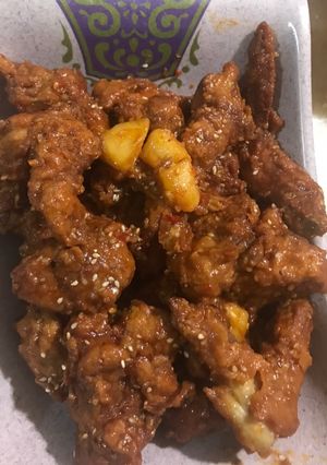 A picture of Sweet and sour chicken wings.