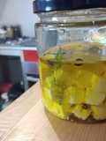 Feta en aceite saborizado