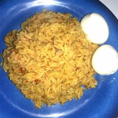 A picture of Curry rice with eggs.
