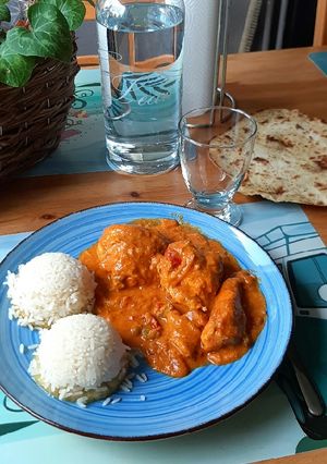 Una foto de Tikka kurry con lentejas rojas