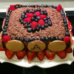 A picture of Vanilla/Rum Cake with Whipped Chocolate Ganache.
