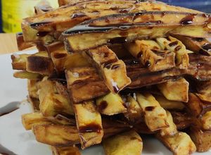 Foto principal de Torre de berenjenas fritas con miel de caña deliciosas 🍆