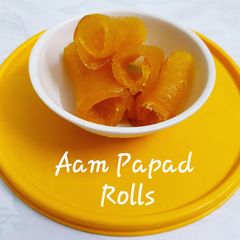 A picture of Aam Papad Mango leather rolls Mango candy.