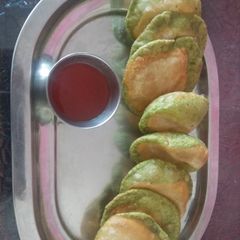 A picture of Spinach carrot tricolor puri.
