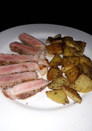 Una foto de Papas al tequila y especias