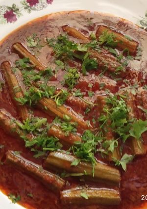 A picture of Drumsticks sabji in sweet and sour gravy.