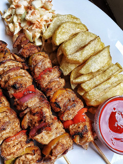 A picture of Juicy chicken skewers/mshikakis.