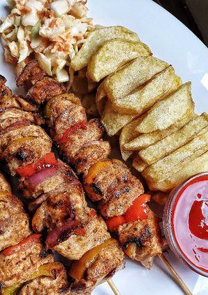 A picture of Juicy chicken skewers/mshikakis.