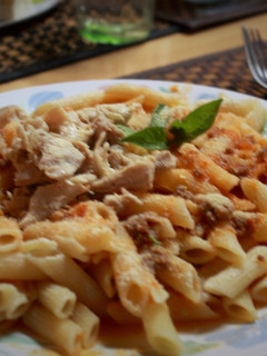 Una foto de Pasta arrabiata con pollo