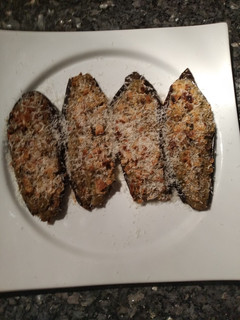 Una foto de Berenjenas rellenas de carne y champiñones