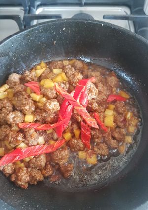 A picture of Sauteé potato and beef.