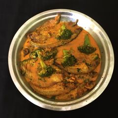 A picture of Mustard and Broccoli Fish Curry.