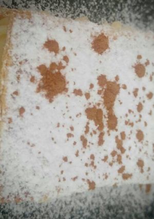Una foto de Milhojas caramelizadas con crema