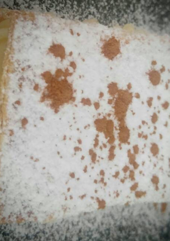 Una foto de Milhojas caramelizadas con crema