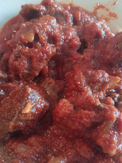 Una foto de Carne con tomate