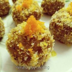 A picture of Orange flavour coconut ladoo.