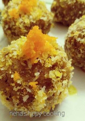 A picture of Orange flavour coconut ladoo.