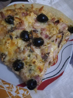 Una foto de Pizza con queso de las finas hierbas en la panicadora del Lidl