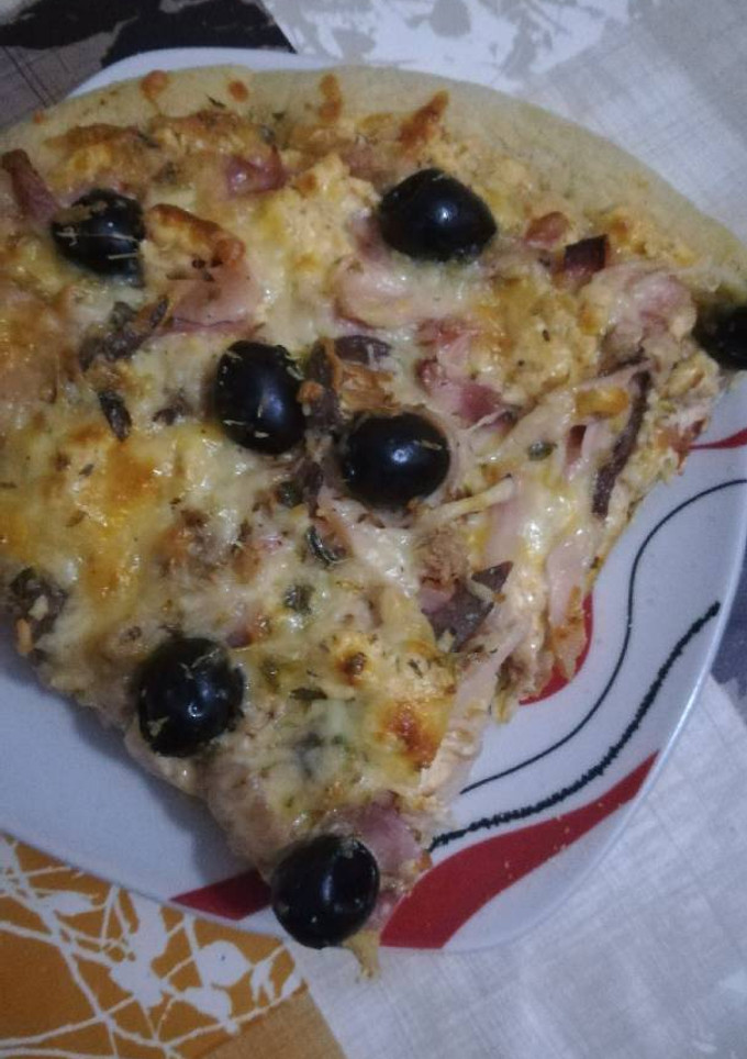 Una foto de Pizza con queso de las finas hierbas en la panicadora del Lidl