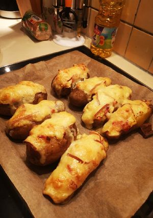 Une photo de Pommes de terres farcies raclette